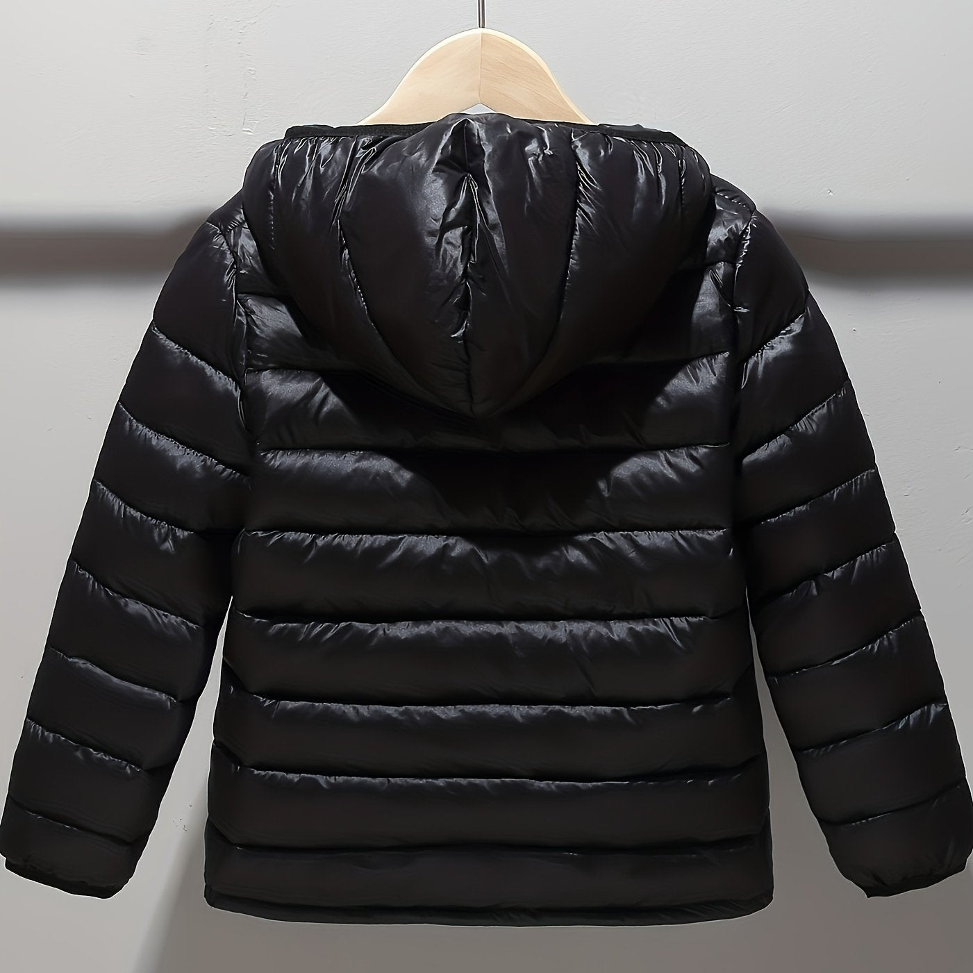 Kids' polyester puffer jacket with hood and zipper, ideal for fall/winter.