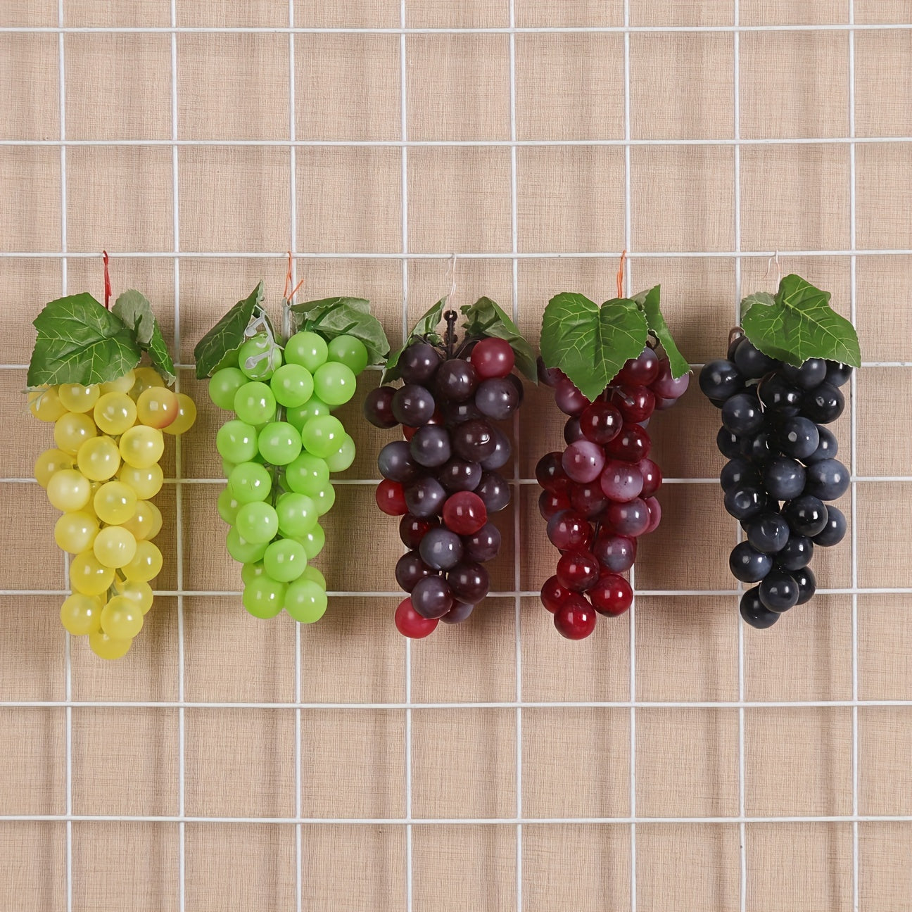 A string of artificial grapes with 36 large beads per string can be hung up for Halloween and Thanksgiving parties, as well as for weddings, kitchen displays, and Christmas gifts.