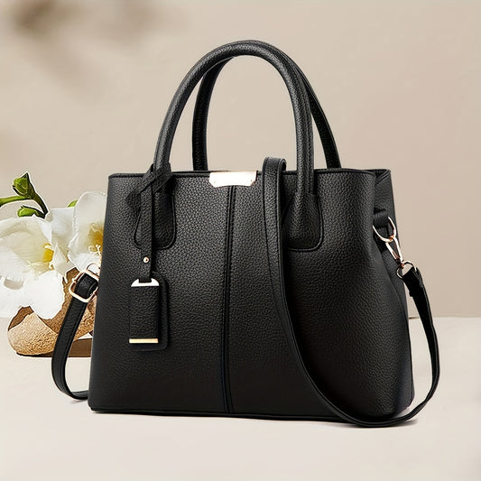 Stylish black quilted tote bag for women, with versatile crossbody and shoulder straps, golden-tone hardware, polyester lining, and zip closure - perfect for daily commuting.