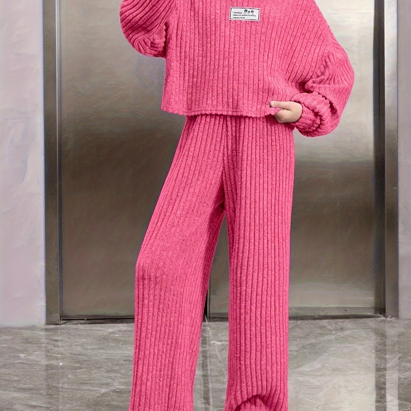 Kids casual knit set with long sleeve hoodie and wide leg pants, ideal for urban outdoor activities in fall and winter.