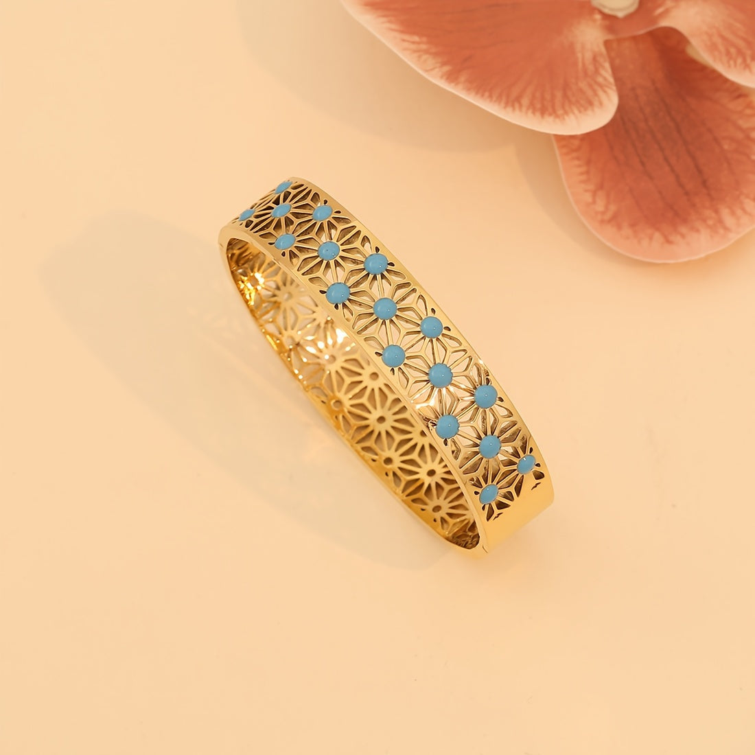 1pc of Vintage Style 18K Golden Plated Stainless Steel Bracelet featuring Turquoise Inlay and Hollow Pattern Design, specially designed for women as a Daily Wear Jewelry piece. This bracelet is the perfect Valentine's Day Gift.