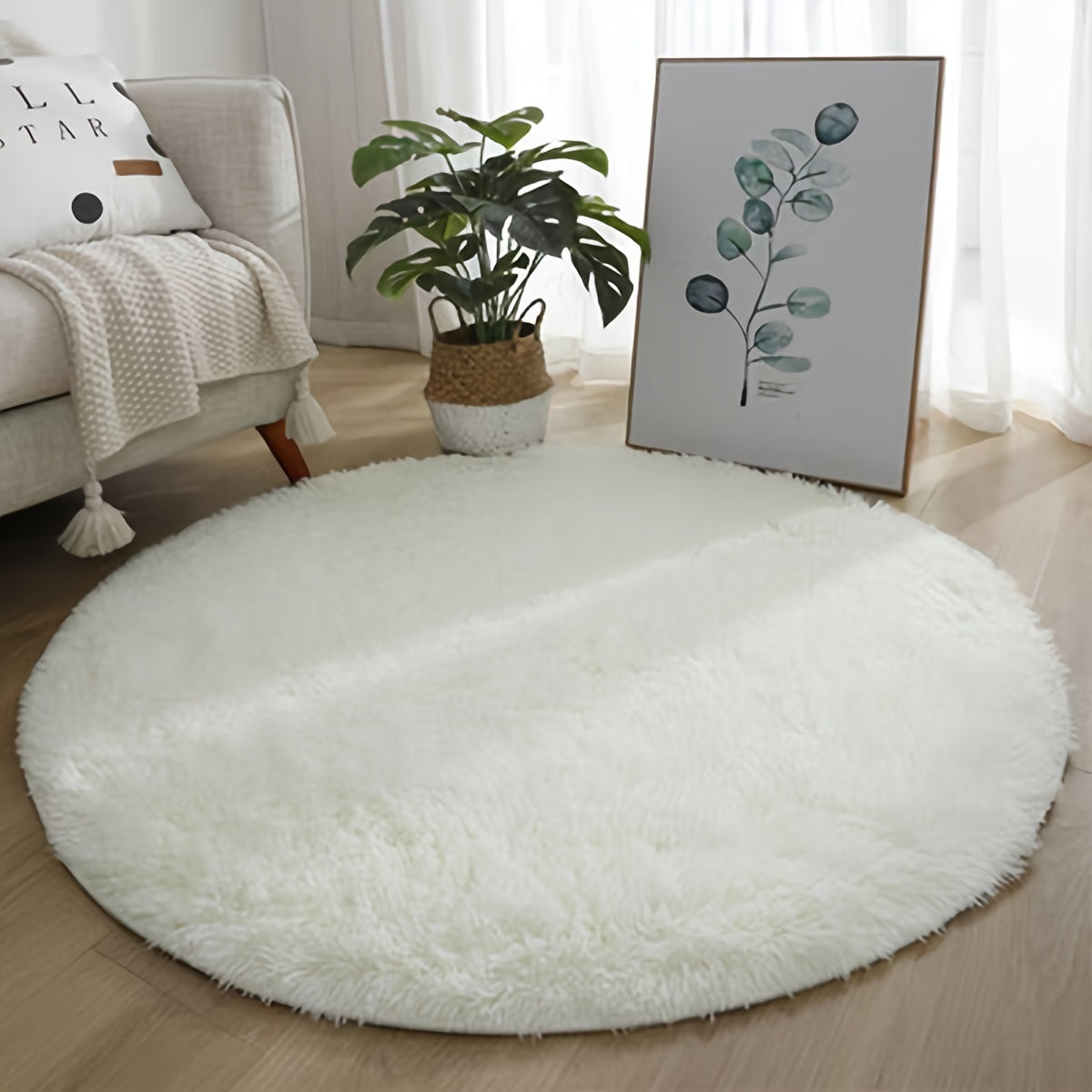 Large round area rug made of soft plush shaggy material, featuring a non-slip and waterproof design. This polyester fiber rug can be hand washed and is perfect for adding a cozy touch to your living room, bedroom, nursery, game room, dorm, or teen room