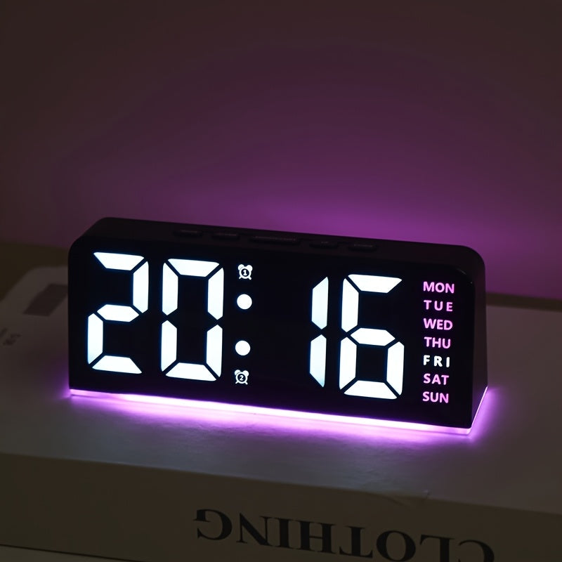 Digital LED Alarm Clock with USB power, sleek black plastic frame, dual time display, modern design for bedroom decor. Battery-operated (AAA not included).