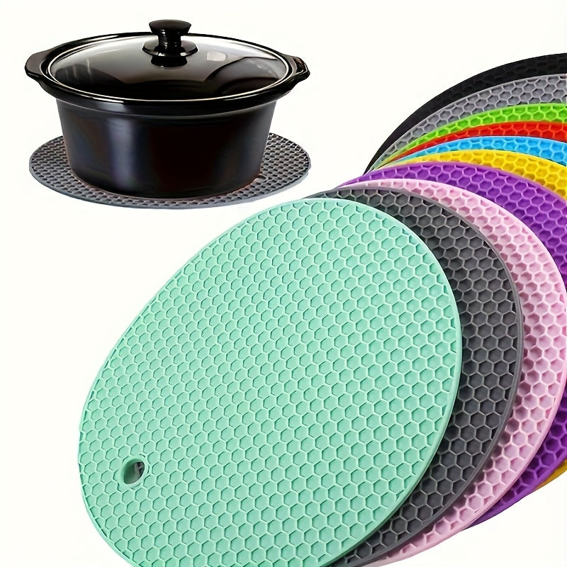 This durable silicone mat is the perfect essential kitchen accessory for Ramadan Mubarak. It is heat resistant and non-slip, with a thick grip pad that can be used for a variety of purposes such as a can opener, placemat, tea pot coaster, spoon holder