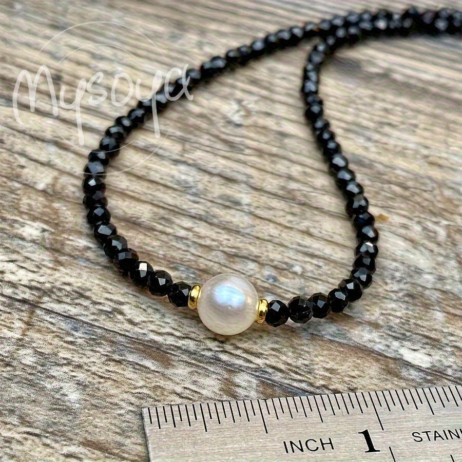 This exquisite Black Onyx and Freshwater Pearl Necklace is lovingly handcrafted and is the ideal gift for anyone. Whether it's for her or him, this timeless piece is perfect for daily wear or special occasions like weddings. The Black Onyx gemstone is