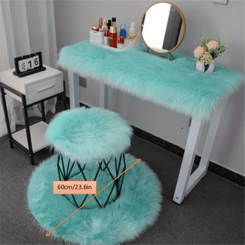 Soft and fluffy, this pink faux sheepskin fur area rug is perfect for adding a cozy touch to any room. Ideal for living rooms, dorms, bedrooms, nurseries, this shag rug is both stylish and practical. Easy to clean and great for placing under a dresser or