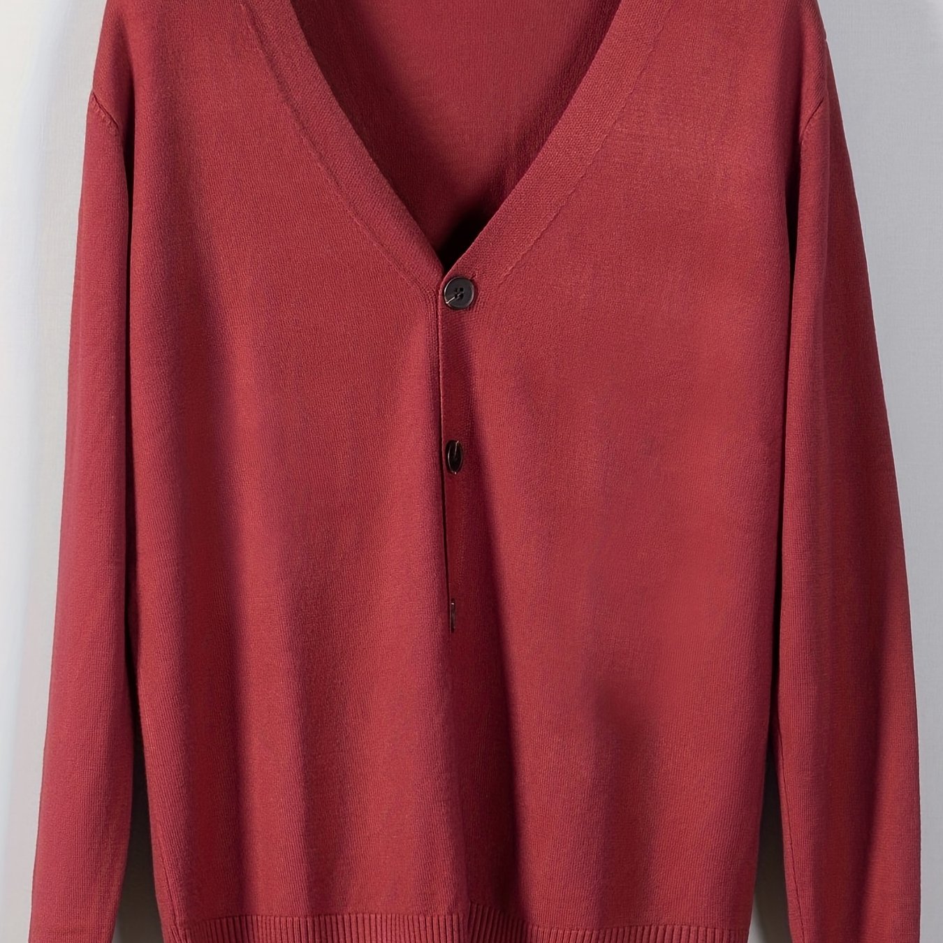 Men's plus size V-Neck cardigan made of viscose blend knit with rib-knit details, long sleeves, and button placket. Perfect for spring/fall, semiformal occasions. Stylish, ribbed edges.