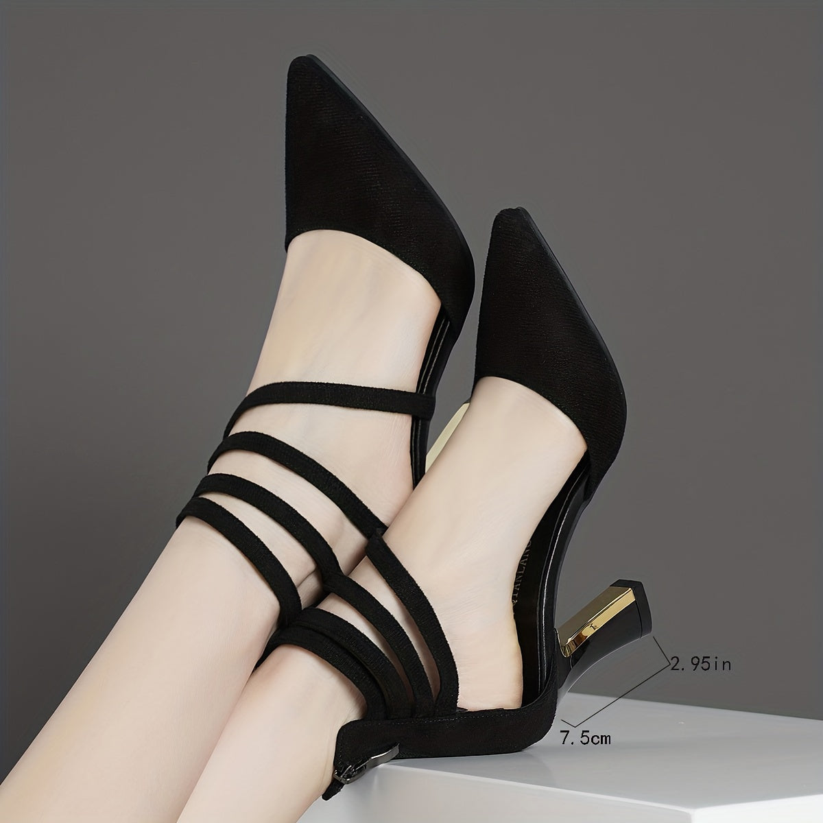 Women's sandals with pointed thin straps and thick heels.