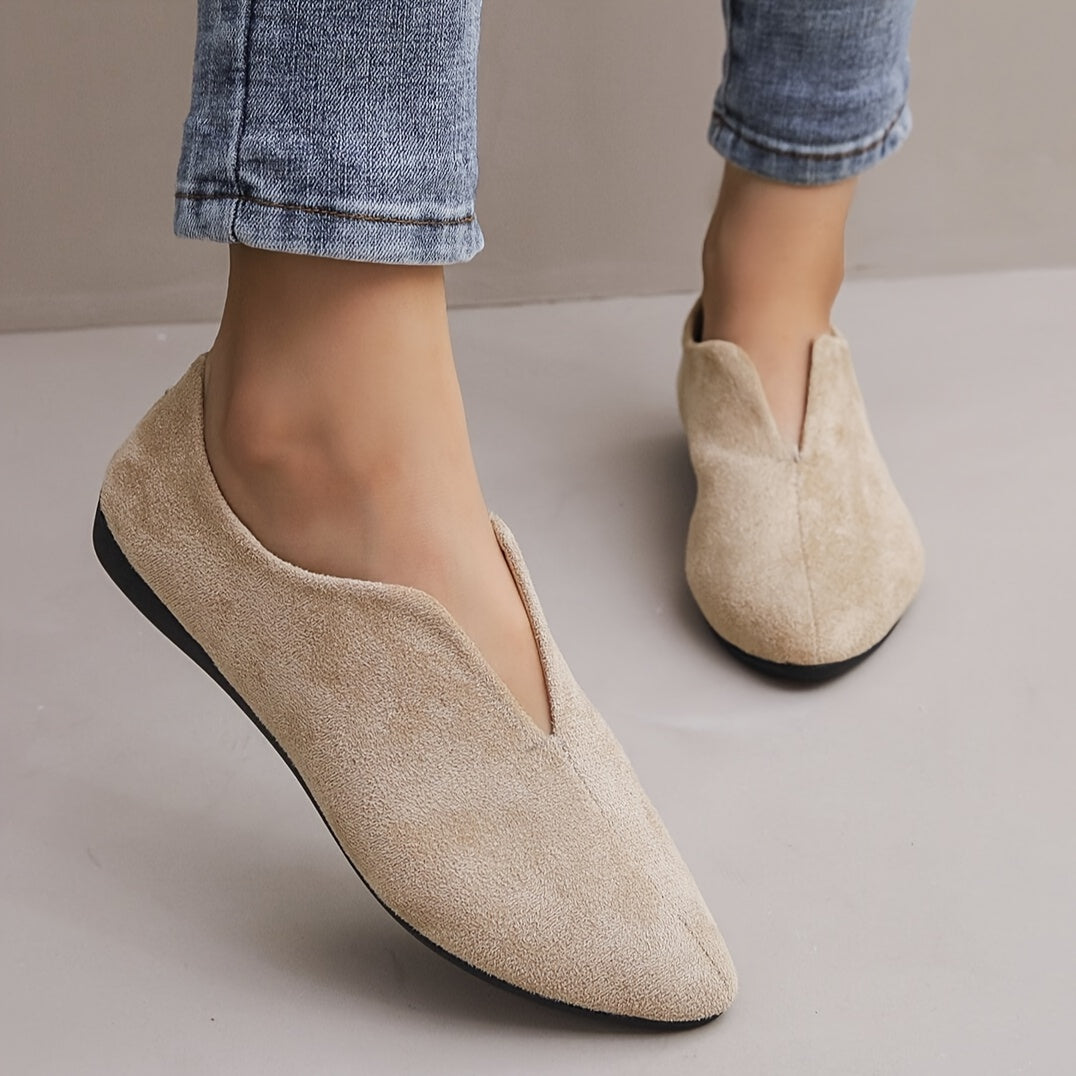 Women's solid color casual flats with a soft sole and point toe.