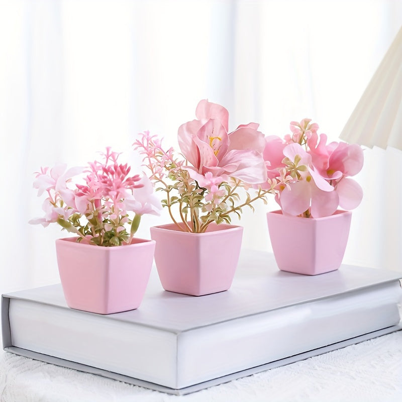 3 mini pink potted plants with faux rose and peach embroidered ball flowers for wedding, home, or office decoration.