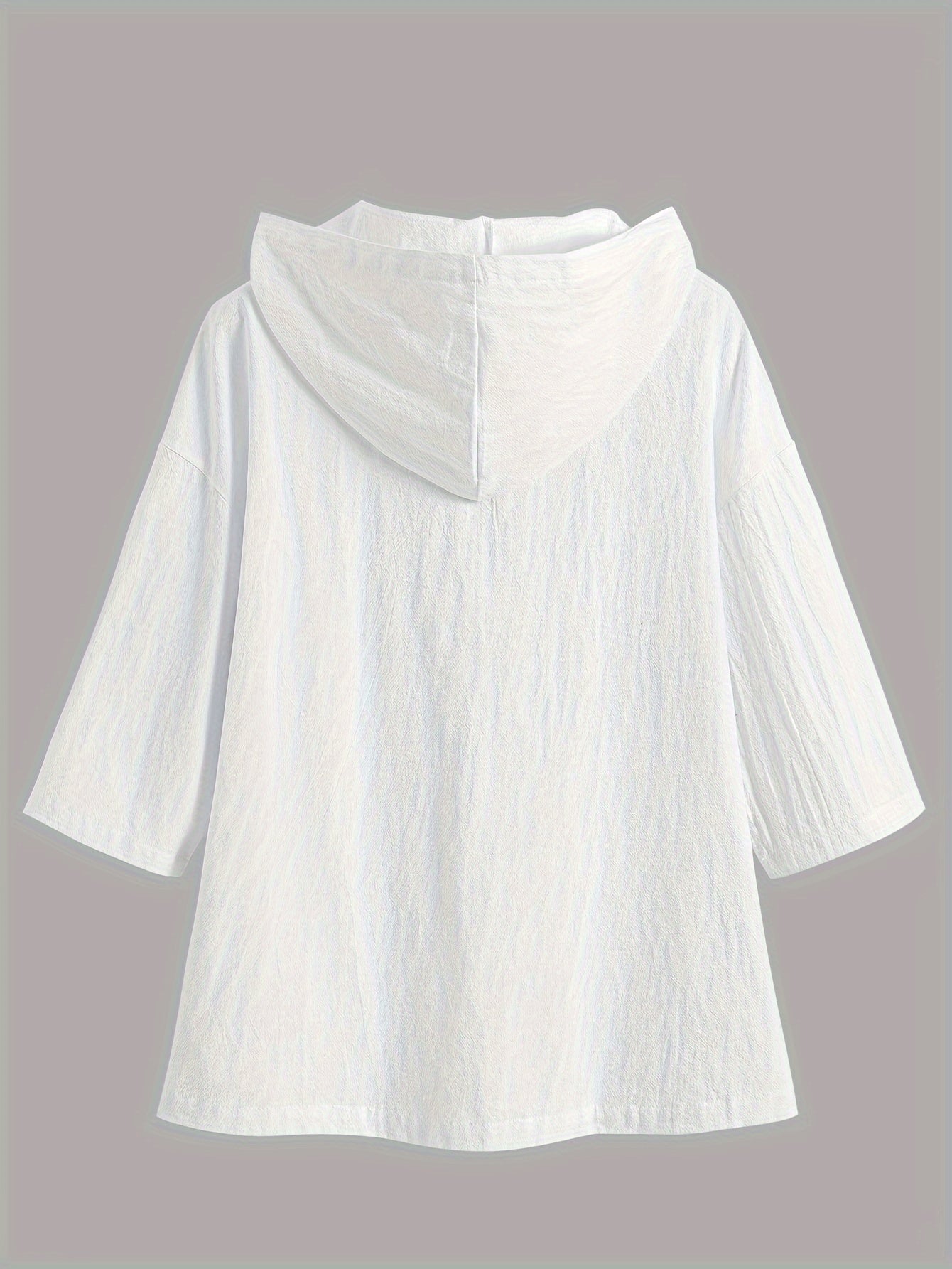 Loose-fitting short-sleeve top with hood and button closure.