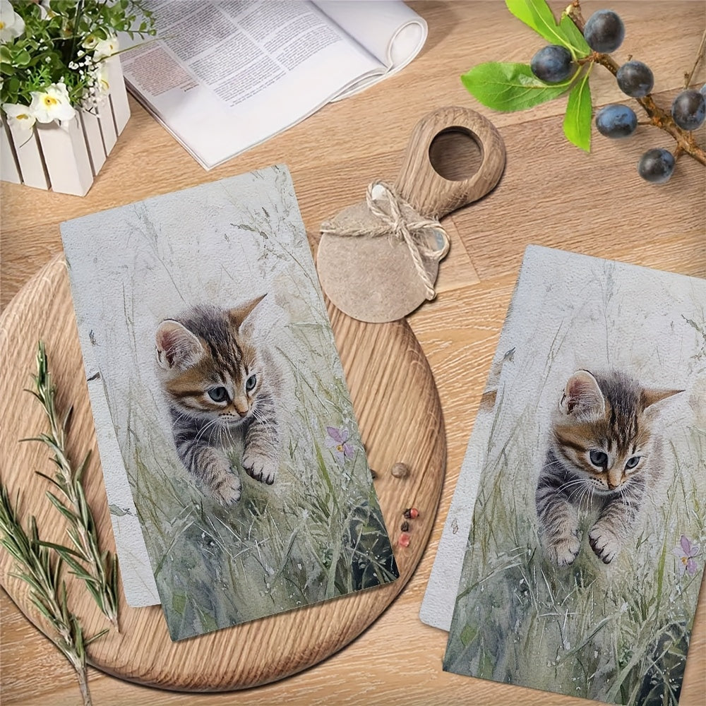 Two ultra soft kitchen towels featuring an adorable kitten in grass design. These towels are highly absorbent, machine washable, and perfect for adding a contemporary coastal touch to your kitchen decor. Each towel measures 40.64x60.96 cm. Perfect for