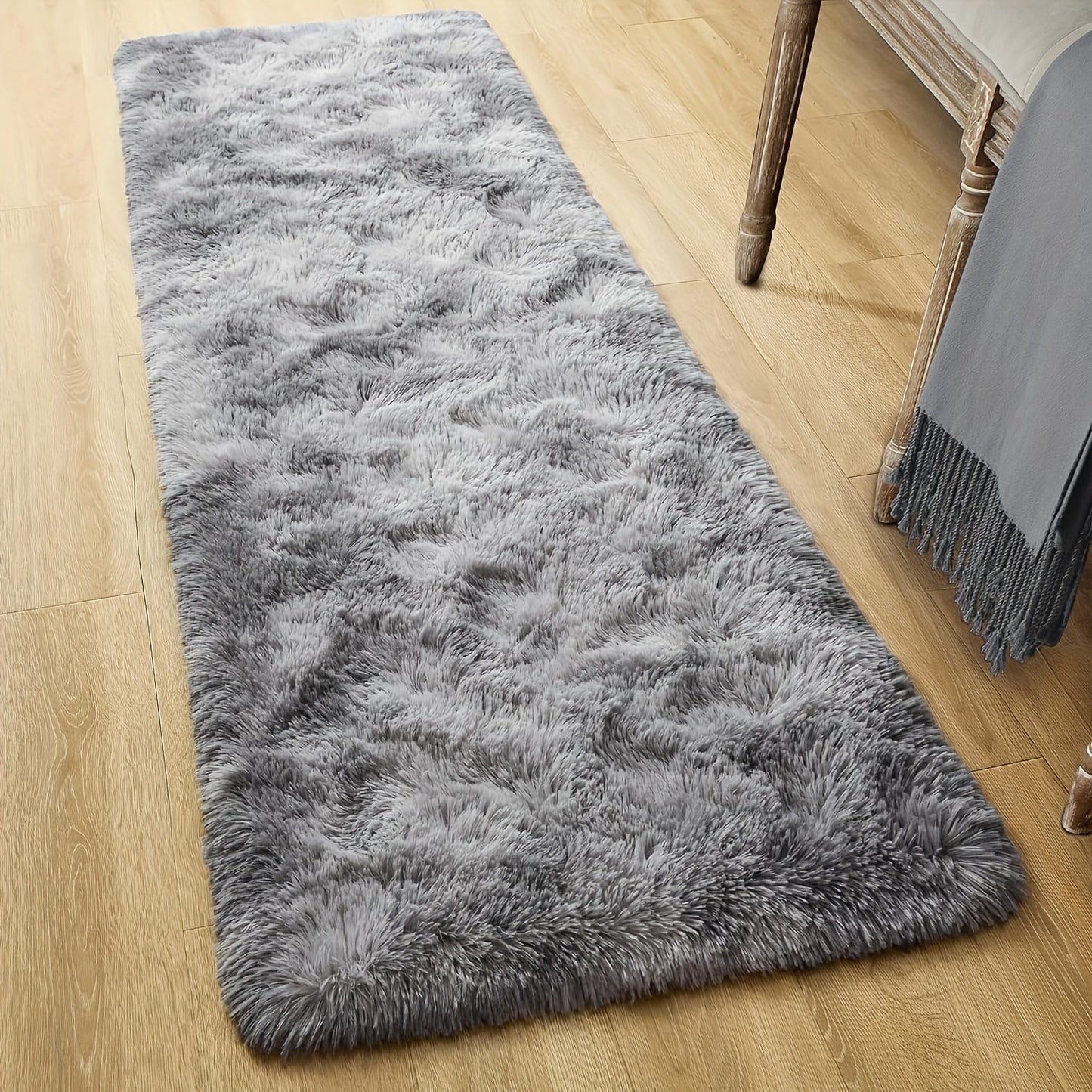 The Soft and Cozy Shaggy Carpet is ideal for the living room, bedroom, and hallway. It comes in a variety of colors and is simple to maintain with dry cleaning. With its rectangular shape, it can be used in multiple areas of the home. Constructed from