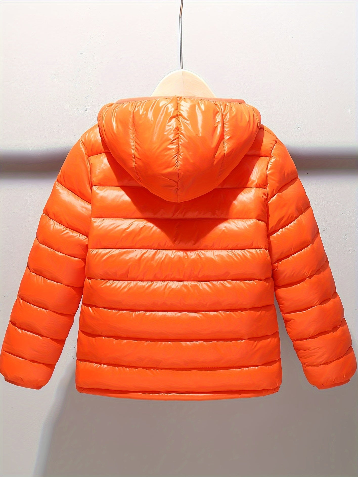 Kids' polyester puffer jacket with hood and zipper, ideal for fall/winter.