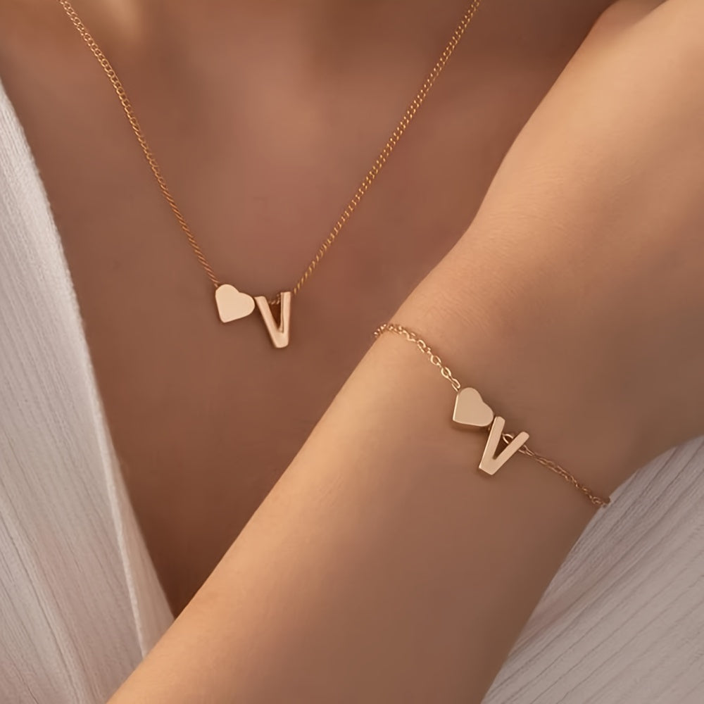 Chic two-piece set with metal heart and letter necklace and bracelet, ideal for daily wear.