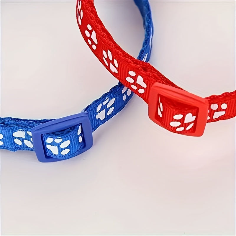 10 adjustable nylon pet collars with bells featuring vibrant cartoon paw & footprint design for dogs and cats