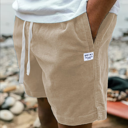 Corduroy shorts with pockets and drawstring for summer casual fashion for men.