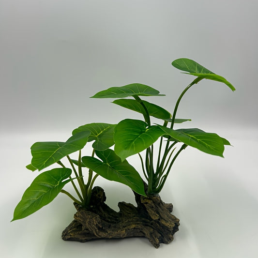 Individual driftwood with green leaves made from ABS material, ideal for aquarium decor