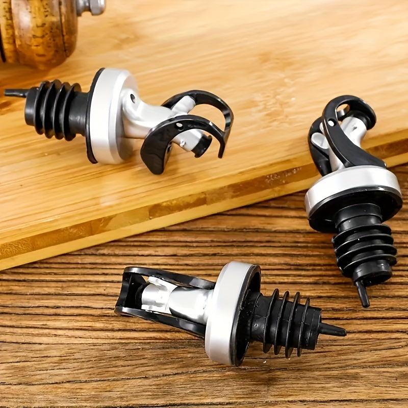 2 reusable vinegar bottle stoppers with automatic opening/closing, spill-proof, dust-resistant design. Ideal for restaurants, homes, and commercial use.