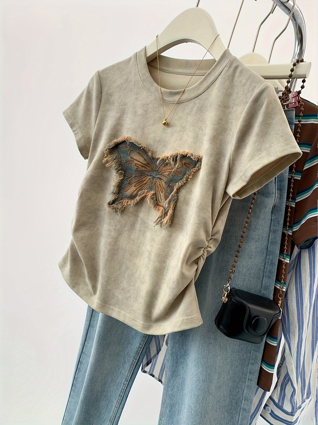 Short sleeve butterfly patch t-shirt for spring and summer. Casual crew neck top for women.