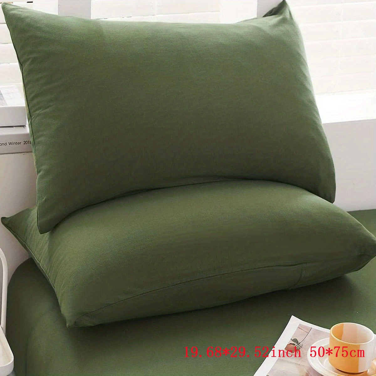 Two luxurious Army Green pillowcases made of soft brushed polyester, featuring a 100% weave. These pillowcases are machine washable and have a zipper closure for easy use. They are both elegant and durable, making them perfect bedroom accessories for