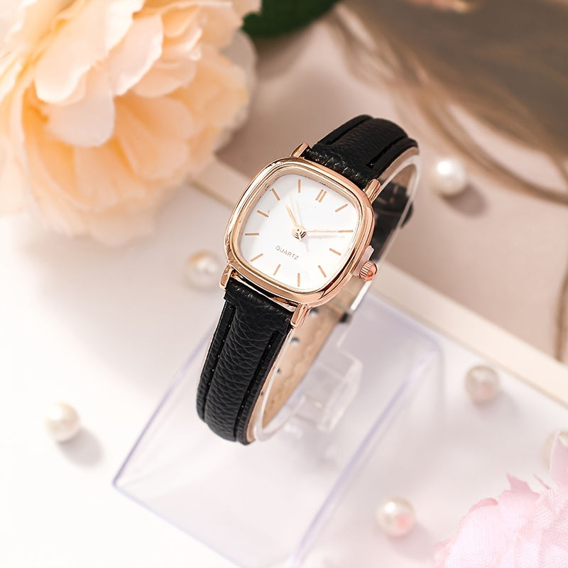 Elegant women's wrist watch with synthetic leather band, quartz movement, rectangular dial, pointer display, electronic drive, button battery powered.