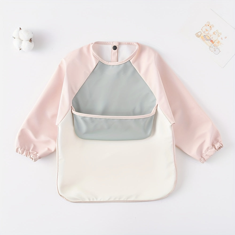 Long-sleeved reverse dressing bib for eating, with a super soft waterproof pocket for feeding.