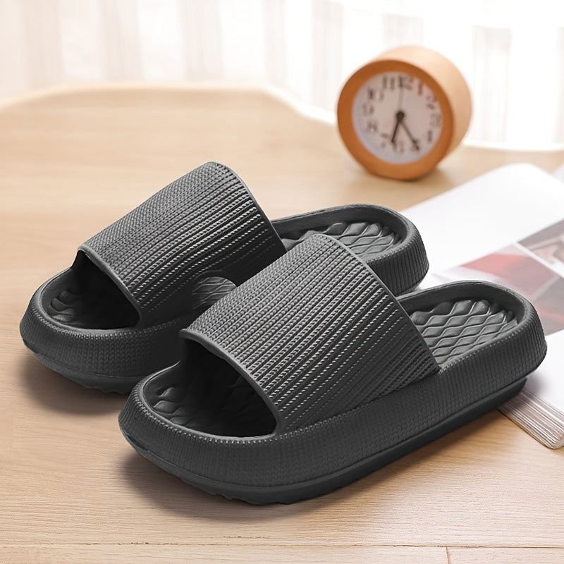 Stylish summer slides for women with thick soles, round toe, and non-slip flat heel, perfect for indoor and outdoor wear, made of comfortable EVA material.