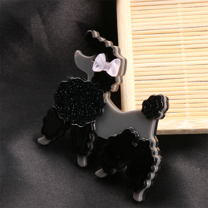 Add flair to your outfit with this Acrylic Black Poodle Brooch! This unique pin exudes charm and adds a touch of sophistication to any look. It makes a perfect accessory gift for friends during the holiday season.