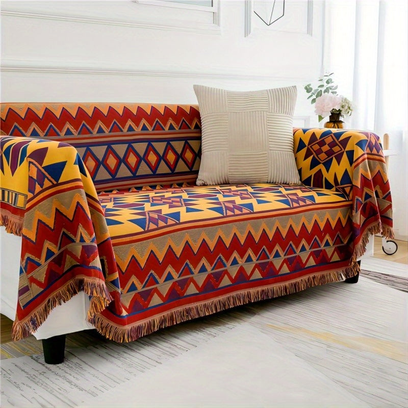 Add a touch of Aztec charm to your home with this Bohemian-inspired reversible throw blanket. Featuring a geometric pattern, chunky knit weave, tassel embellishment, and made from all-season multipurpose synthetic fiber, it is the perfect couch protector