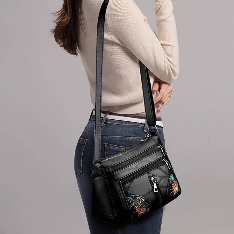 New neutral square bag with one-shoulder oblique strap and hand-painted pattern.