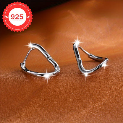 These stunning S925 sterling silver square geometric hoop earrings are designed with a minimalist and irregular style, perfect for both everyday wear and special occasions. They make the perfect gift, exuding a sense of light luxury that is suitable for