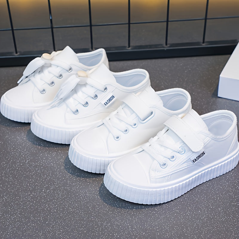 Casual, comfortable low top sneakers for girls made of lightweight, non-slip canvas for all seasons.