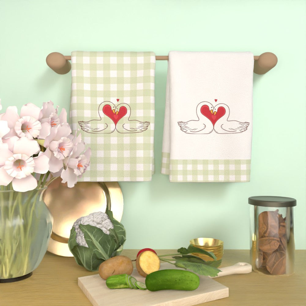 Two pieces of Valentine's Day kitchen towels made of soft, quick-dry polyester material measuring 45.72x66.04cm. Featuring a lovely heart and swans design in vibrant colors, these towels are perfect for use in the home, parties, and outdoor settings.