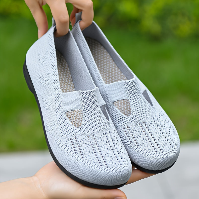 Breathable slip-on sneakers for women with soft sole and non-slip knit upper, ideal for casual wear.