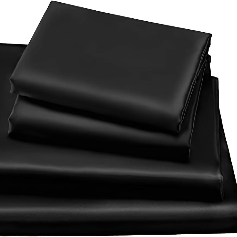 4 pieces of polyester satin solid fitted sheet set includes 1 fitted sheet, 1 flat sheet, and 2 pillowcases, available in Twin, Full, Queen, or King sizes.