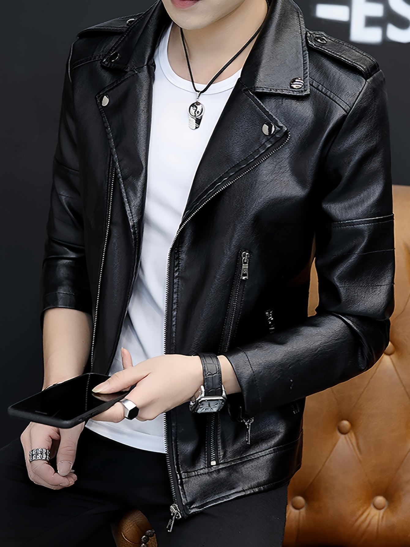 Black zip-up men's casual jacket with multi-pocket design, stylish and protective for casual attire.