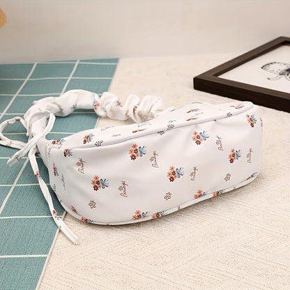 Stylish white and pink floral crossbody bag for women, suitable for daily use, travel, or as a gift.