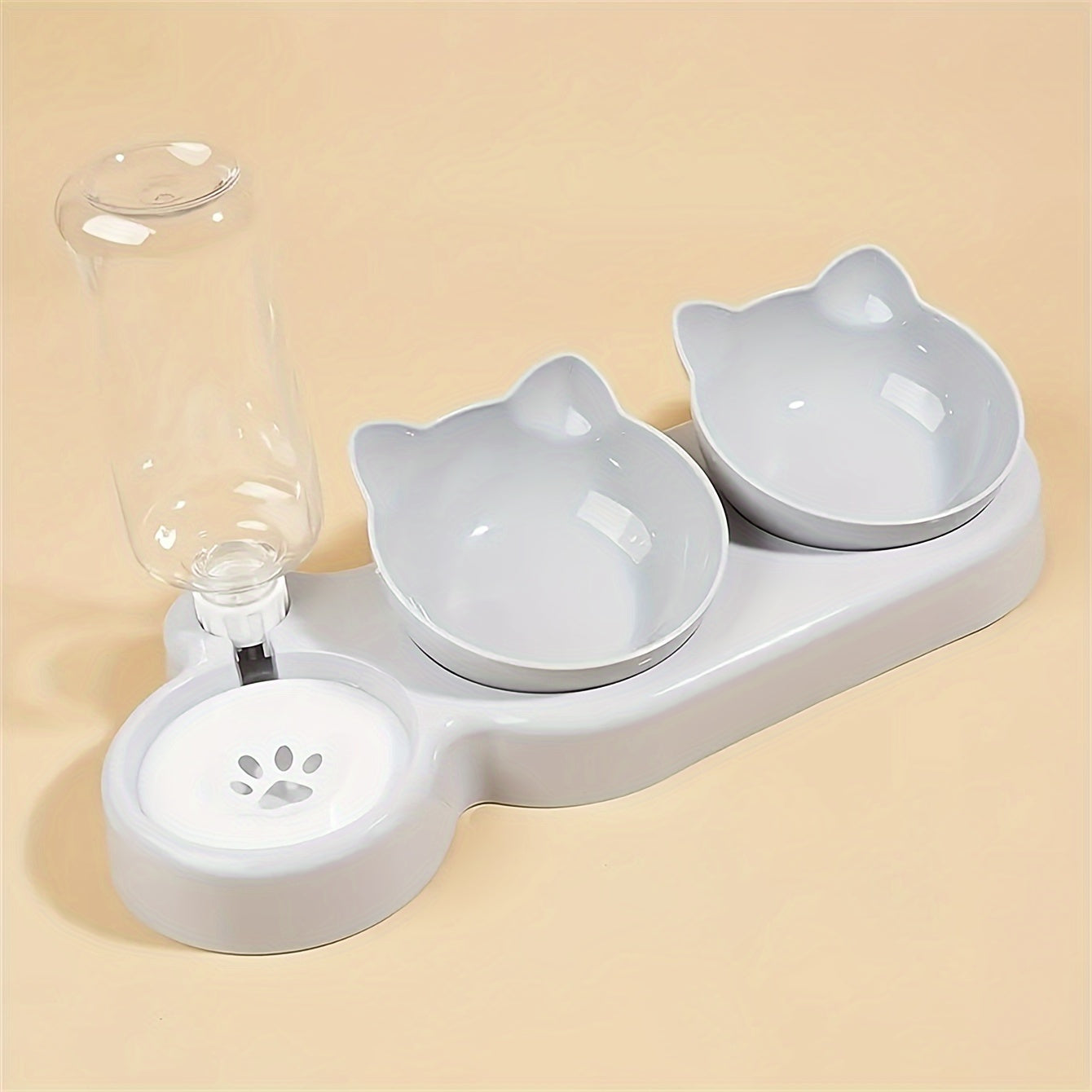 Tilted double pet bowl set with automatic water feeder and gravity water bottle for neck protection.