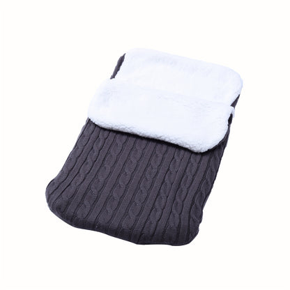 Machine washable baby foot cover with knitted microfiber filling for warmth and comfort.