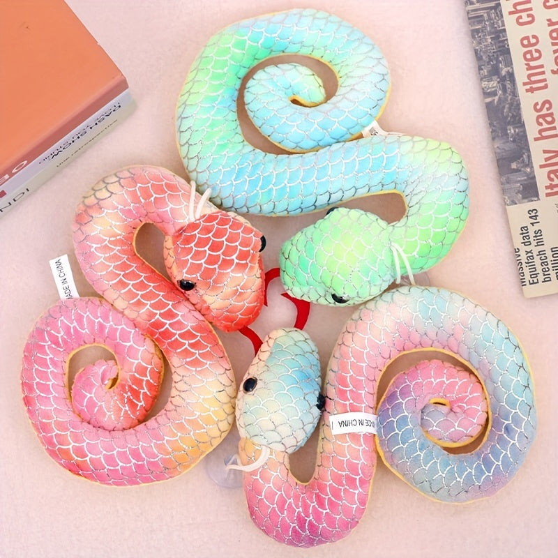 Soft cotton plush pendants in tie-dyed and gilded snake designs, perfect for celebrating the Year of The Snake. Suitable for ages 14 and up.