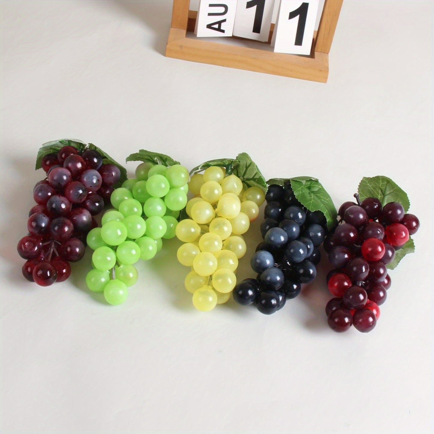 A string of artificial grapes with 36 large beads per string can be hung up for Halloween and Thanksgiving parties, as well as for weddings, kitchen displays, and Christmas gifts.