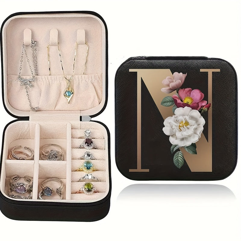 Floral initial jewelry organizer box with compact design, soft velvet lining, durable zipper, and lightweight, ideal for jewelry organization and travel.