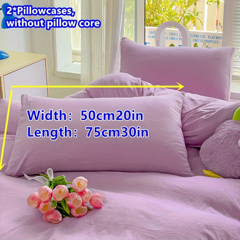 Two polyester pillowcases with a 90g weight, featuring a multi-color printed design with a mix of floral patterns. These pocket pillowcases are suitable for household use.