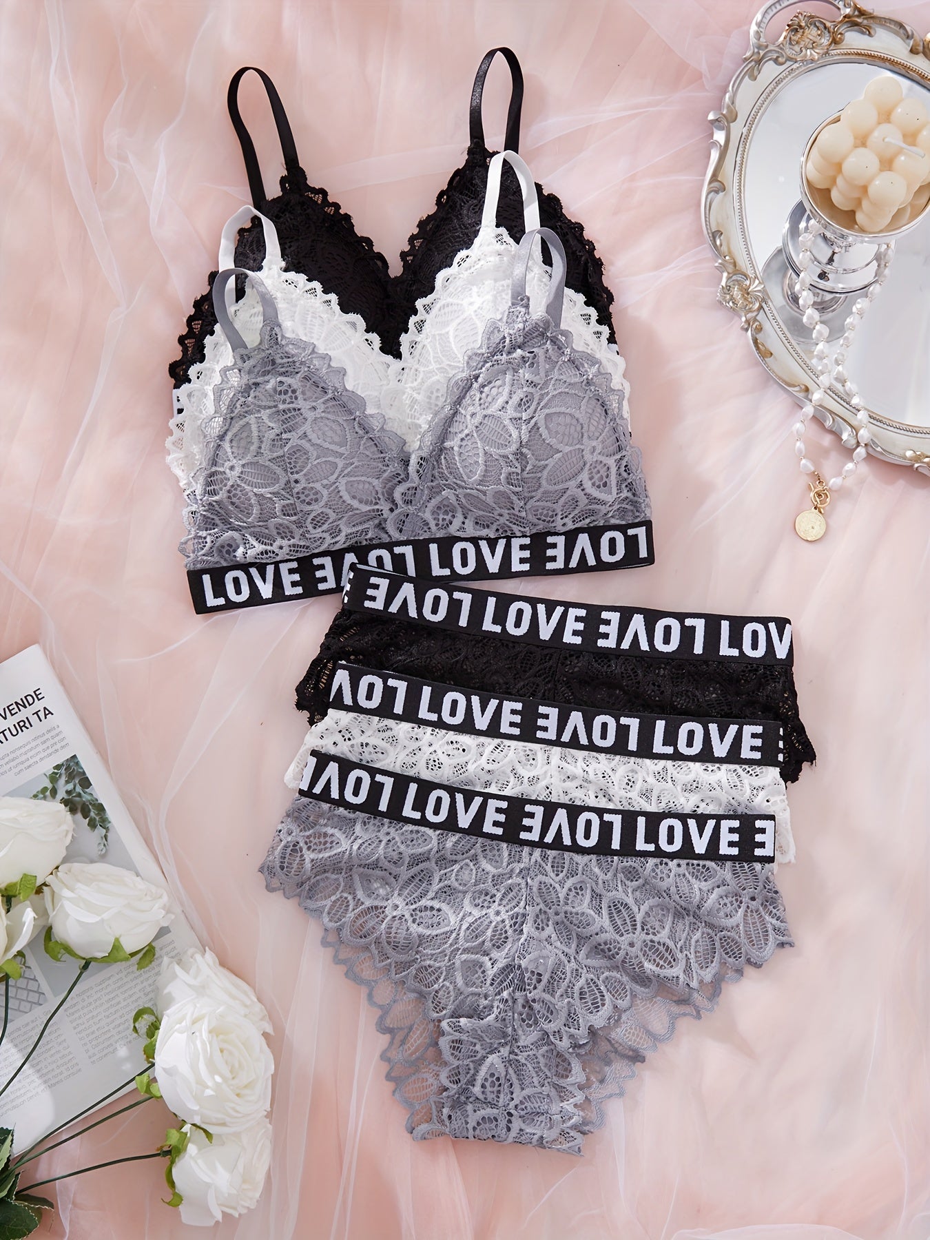 6-piece lace lingerie set for women featuring sporty and sexy wireless bra and panties with "LOVE" waistband. Made with breathable black and white floral lace for a comfortable fit.