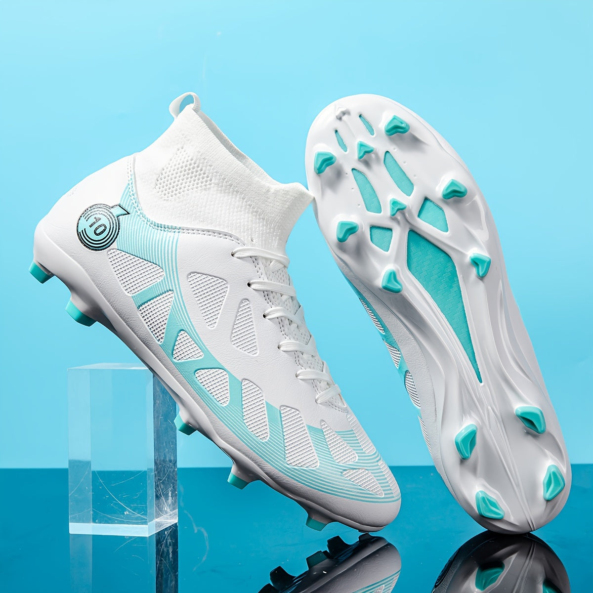 High-top men's soccer cleats with long studs, white & teal design for outdoor training and matches.