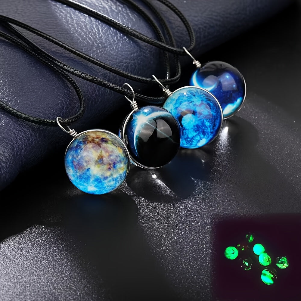 Set of 4 Starry River pendant necklaces featuring dual-sided glass orb and a luminous boho-retro style. Each necklace showcases a cosmic dreamy space gemstone that glows in the dark, making it the perfect accessory for music festivals, travel, and beach