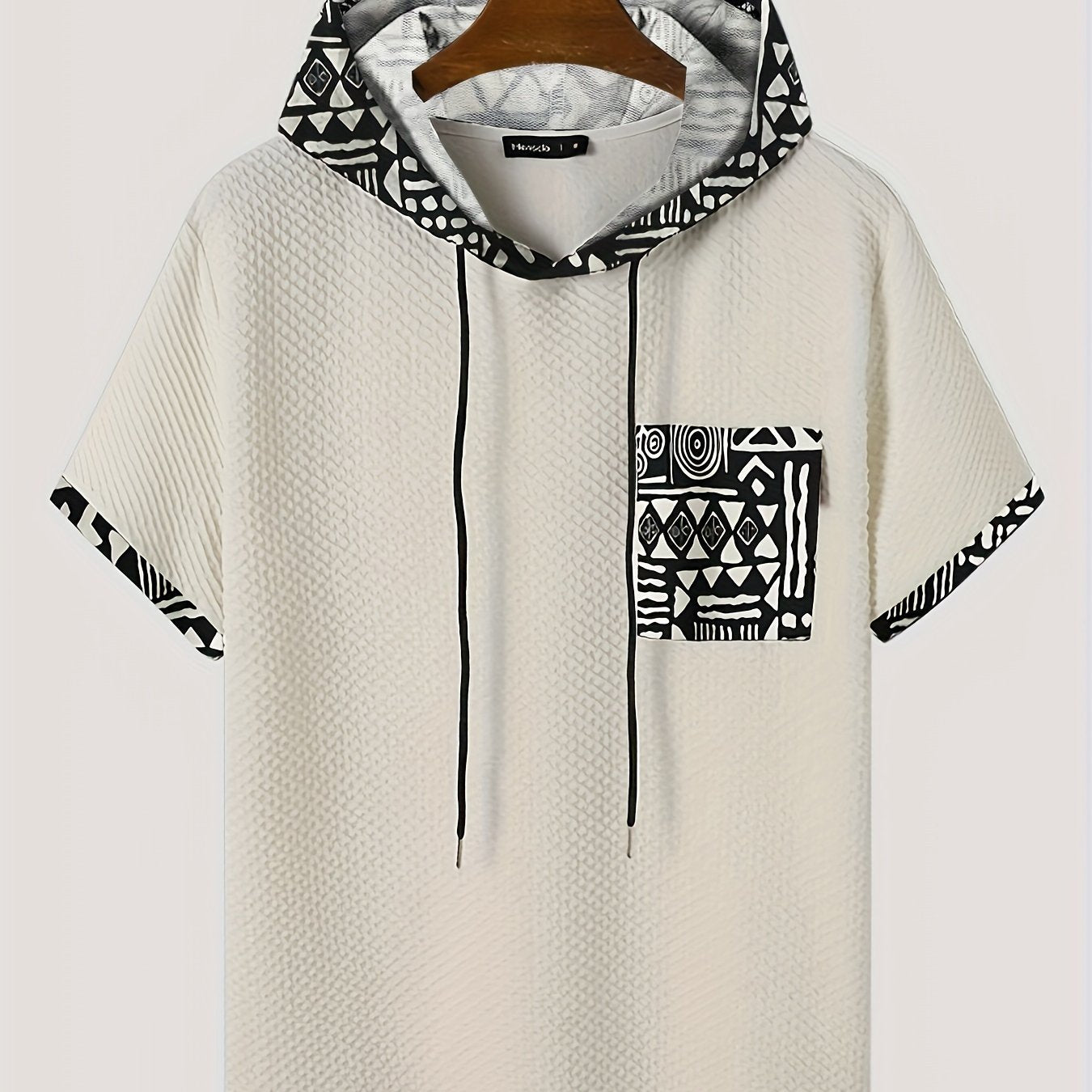 Men's plus size casual hooded t-shirt with geometric print, made from lightweight polyester fabric in gray with black and white patterns. Includes drawstring hood for comfortable fit and