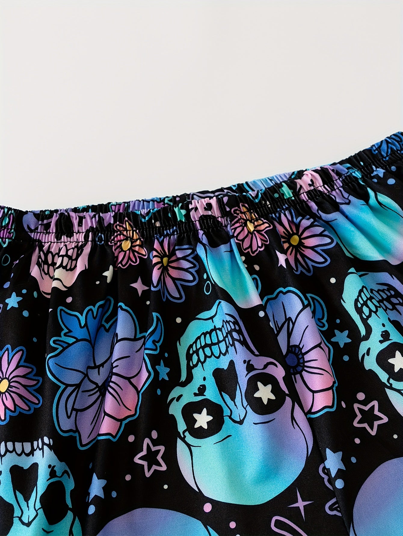 Gothic pajama set with skull and floral print, backless cami top, and elastic shorts for women's sleepwear.