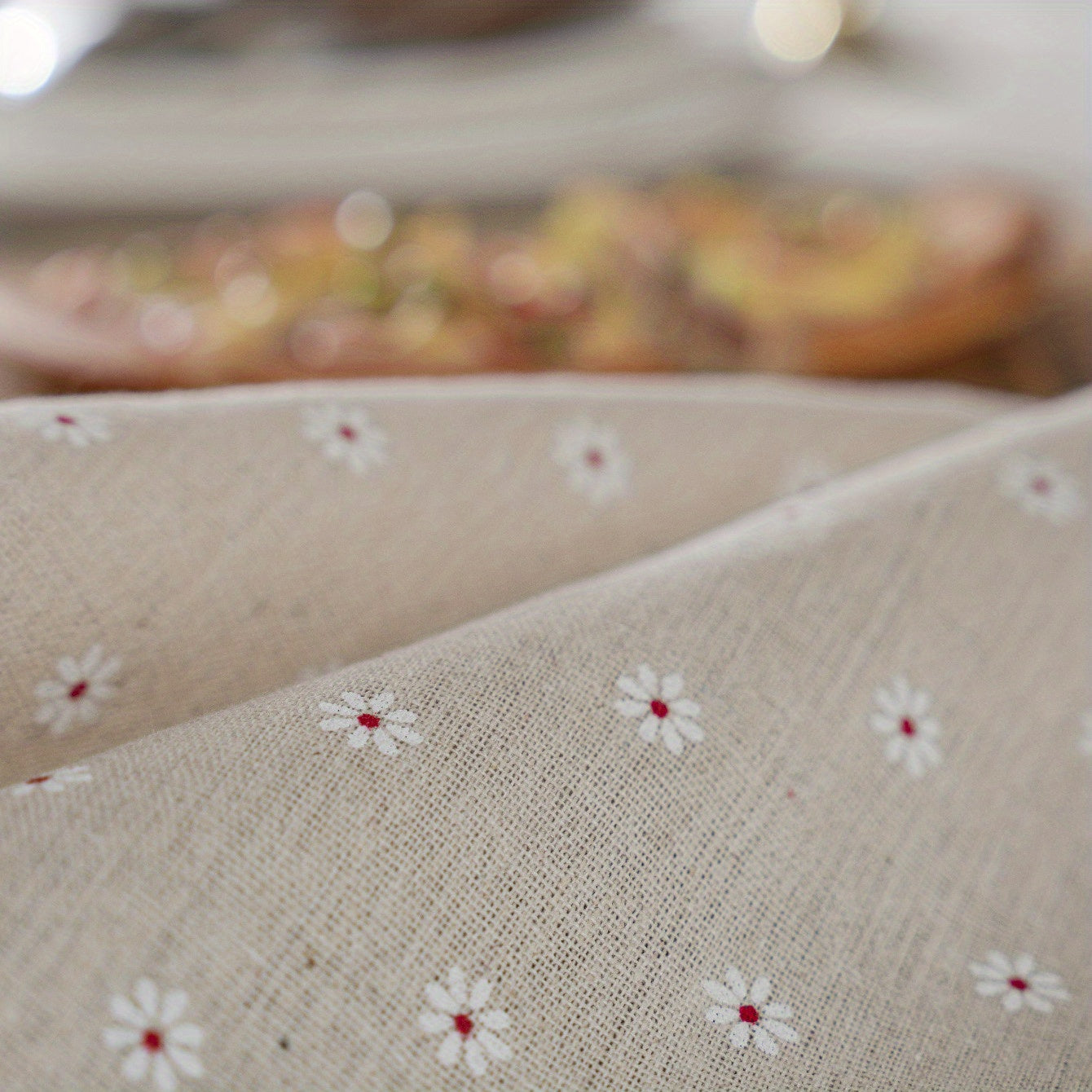 White chrysanthemum and beige linen print farmhouse floral tablecloth with tassels, ideal for kitchen and dining decor. Ready for Thanksgiving, made of polyester, rectangular shape.